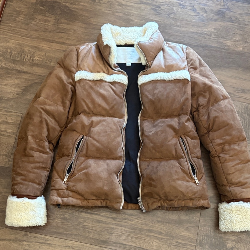COACH 100% soft leather, feather down interior, 100% real shearling trim.